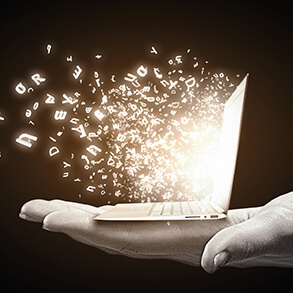 Image of Laptop in a hand